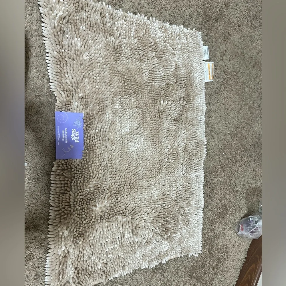 Beige noodle bath rugs